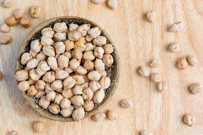 Directly above shot of almonds in bowl on table