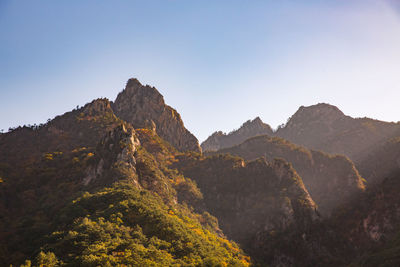 Scenic view of mountains against clear sky