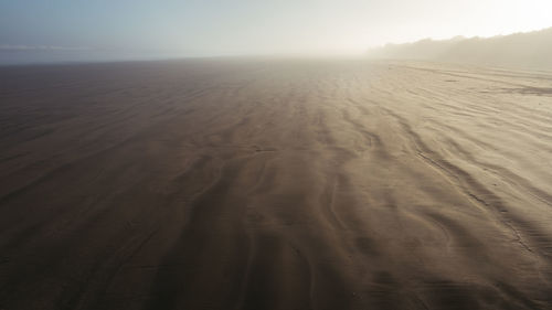 Scenic view of desert against sky