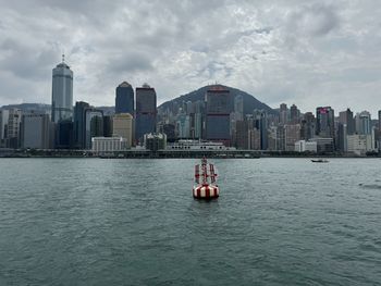 Boats in sea against sky
