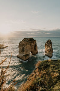 The beautiful raouche rocks at sunset in beirut, lebanon.