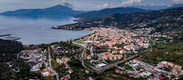 High angle view of townscape by sea