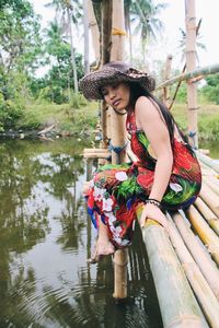 Sitting on the makeshift bridge by the stream