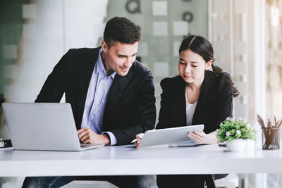 Business colleagues working at office