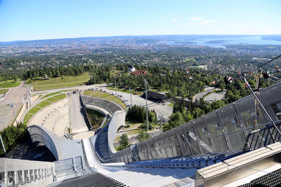 View of cityscape against blue sky