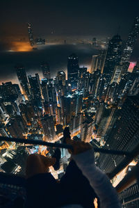 High angle view of illuminated cityscape at night