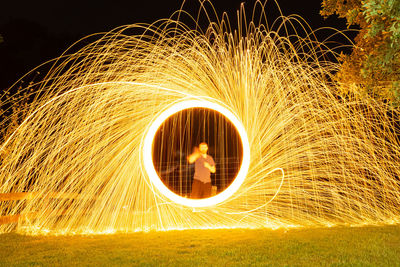 Blurred motion of illuminated lighting equipment at night