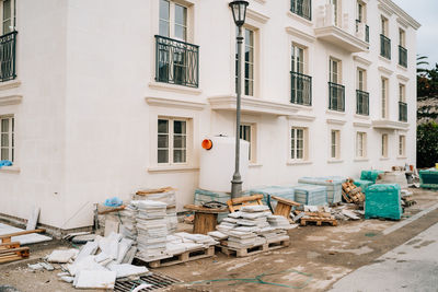 Houses by building in city