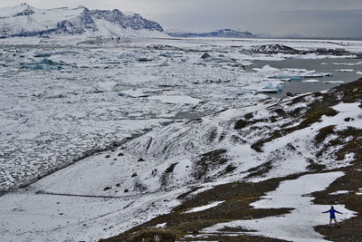 Scenic view of sea against sky during winter