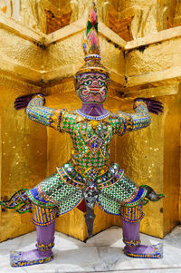 Buddha statue in temple outside building