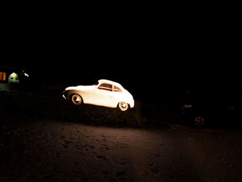 Cars on road at night