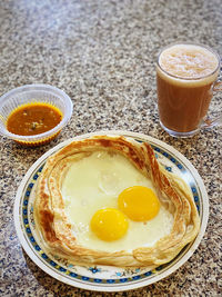 High angle view of breakfast served on table