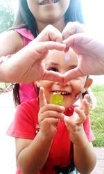 Close-up of hands eating baby