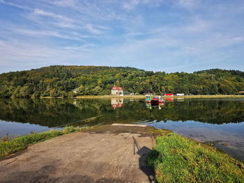 Ferry crossing on the czchowskie lake. a ferry reaching the shore.