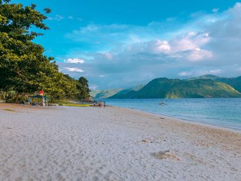 Scenic view of beach against sky