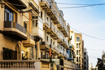 Low angle view of residential buildings against sky