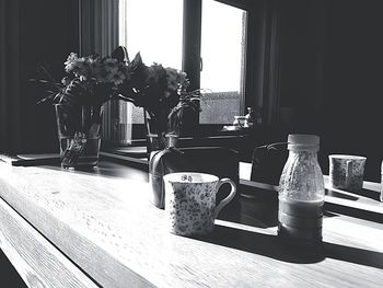 Close-up of glasses on table at home