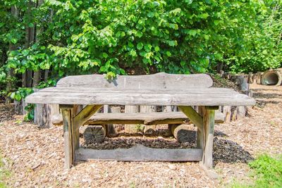 Empty bench on table in park