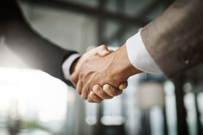 Close-up of business people shaking hands