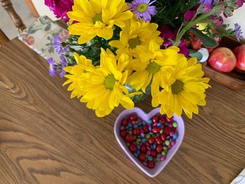 High angle view of multi colored flowers on table