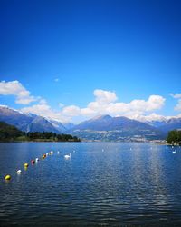 Scenic view of lake against blue sky