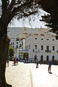 People in front of building