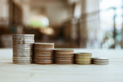Stack of coins on table