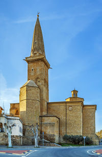 Clock tower against blue sky