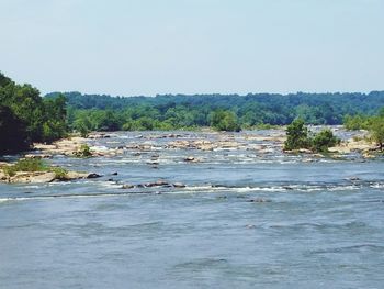 Scenic view of river against sky