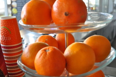 Close-up of oranges on cakestand