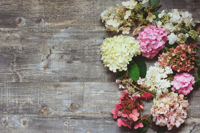 High angle view of pink flowering plant on table