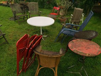 Empty chairs in yard