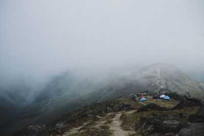 Scenic view of mountains against sky during winter