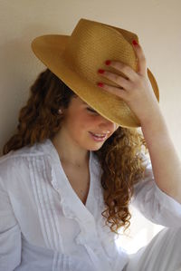 Portrait of woman wearing hat