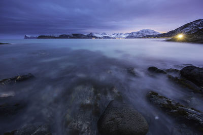 Scenic view of sea against cloudy sky