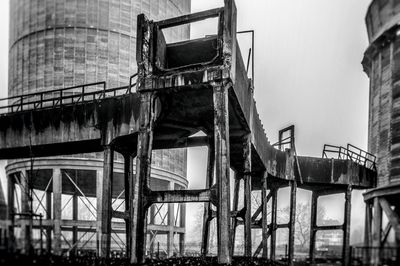 Low angle view of abandoned building against sky