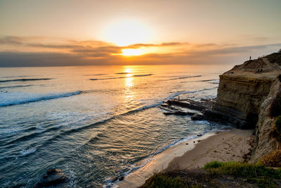 Scenic view of sea against sky during sunset