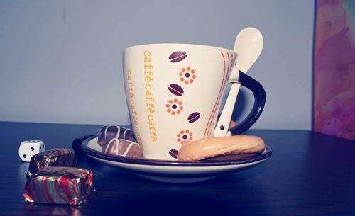 Close-up of coffee cup on table