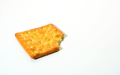 Close-up of bread against white background