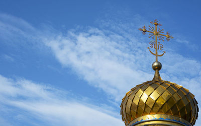 Horizontal blue background with a golden dome of the chapel. blue sky for text. copy space.