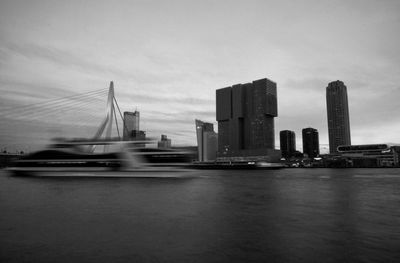 Rotterdam city in black and white with moving vessel