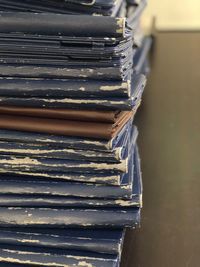 Close-up of stack of books on table