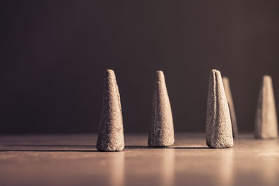 Close-up of objects on table against black background