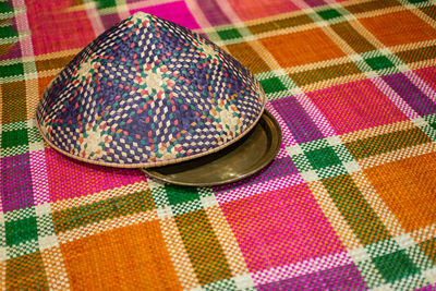 High angle view of multi colored umbrellas on table