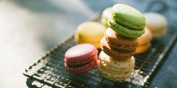 Close-up of macaroons on metal grate