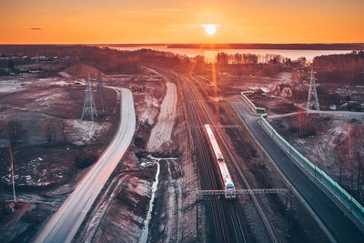 High angle view of highway in city during sunset