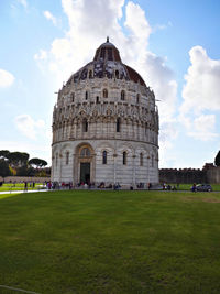 View of piazza dei miracoli against cloudy sky