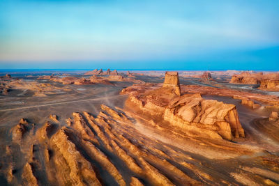 Scenic view of rock formations against sky