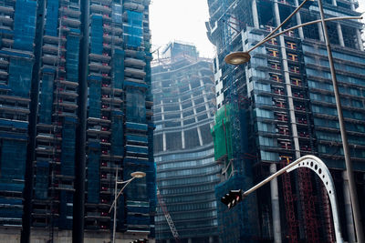 Low angle view of modern buildings in city