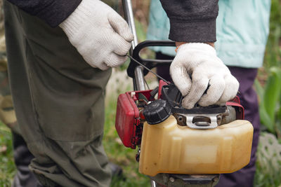 Midsection of man working